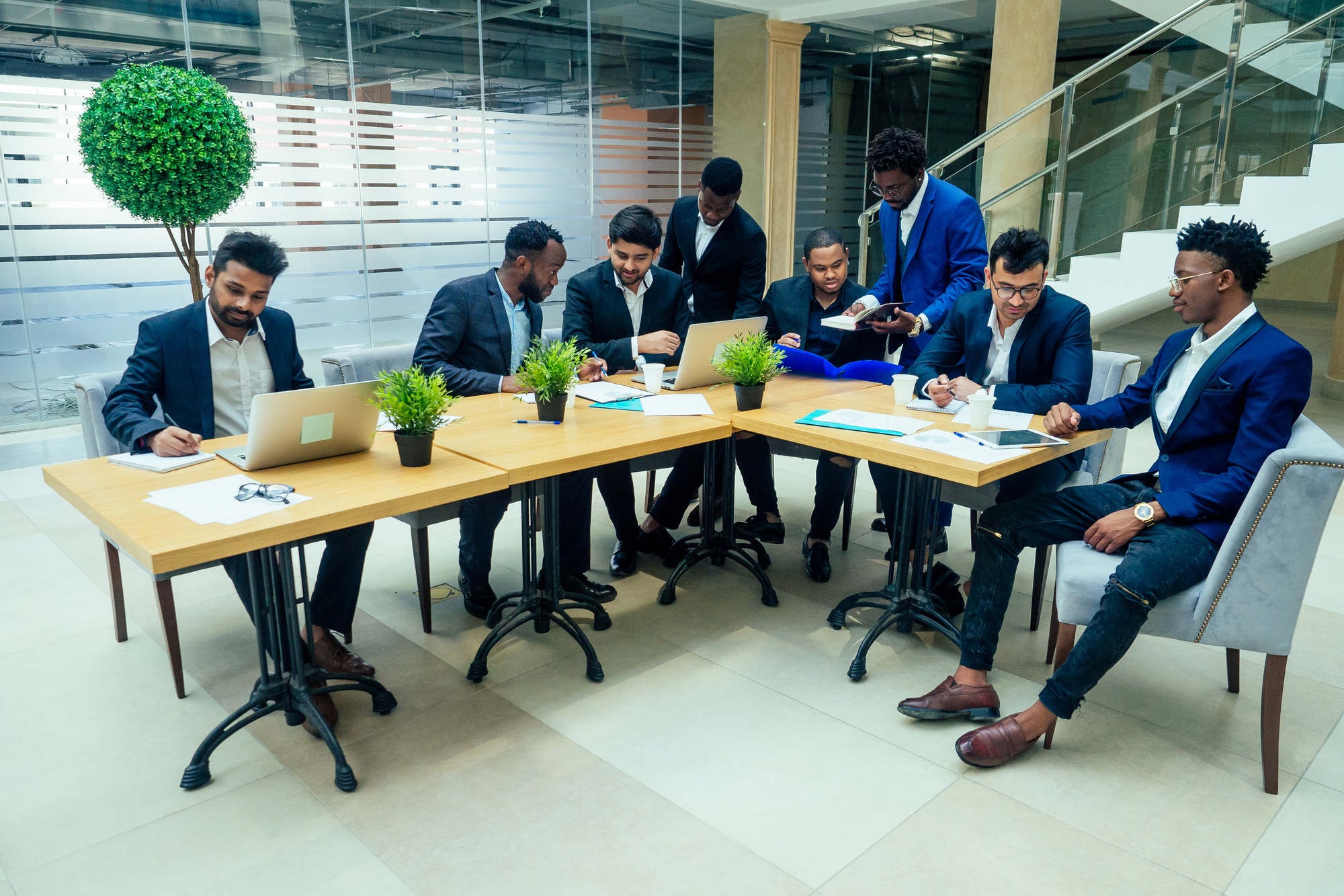 young business group have a meeting in modern eco office.travel insurance concept
